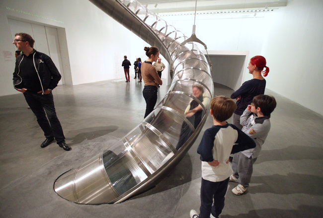 Visitors rode Carsten Höller’s slide in an exhibition at the New Museum of Contemporary Art in 2011 photo nytimes.com