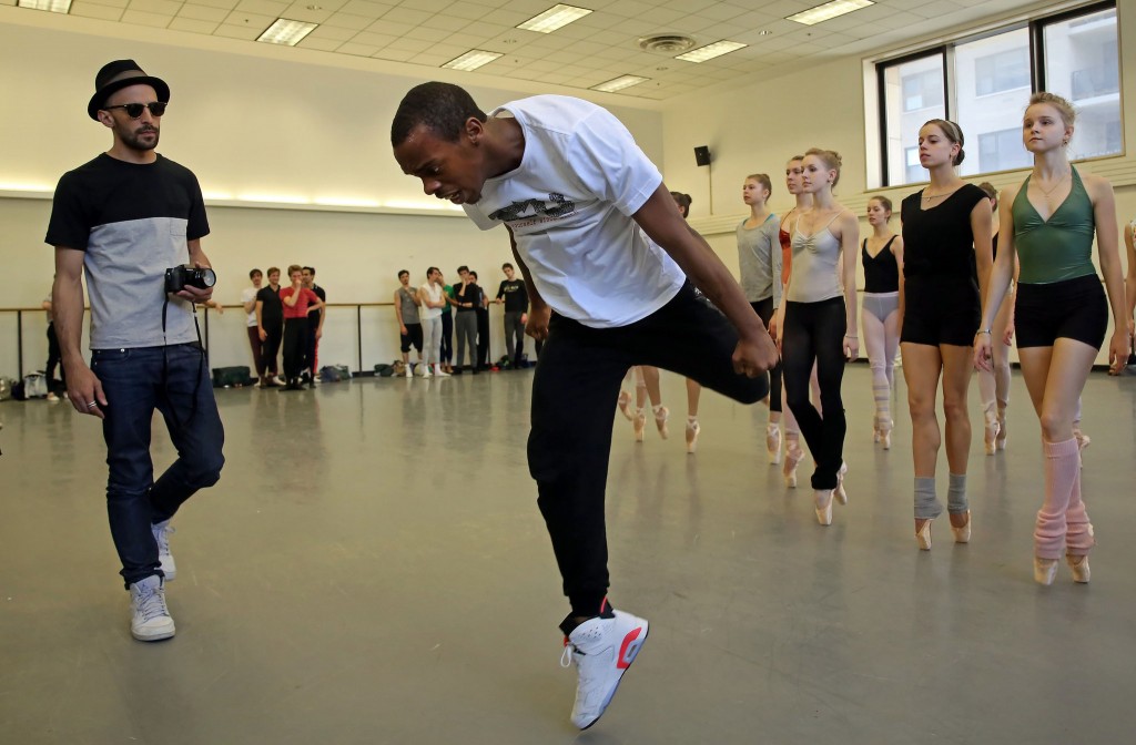 The French street artist J R, far left, working on choreography for the piece “Les Bosquets,” with Lil Buck, center, and City Ballet company members. Credit Andrea Mohin photo nytimes.com